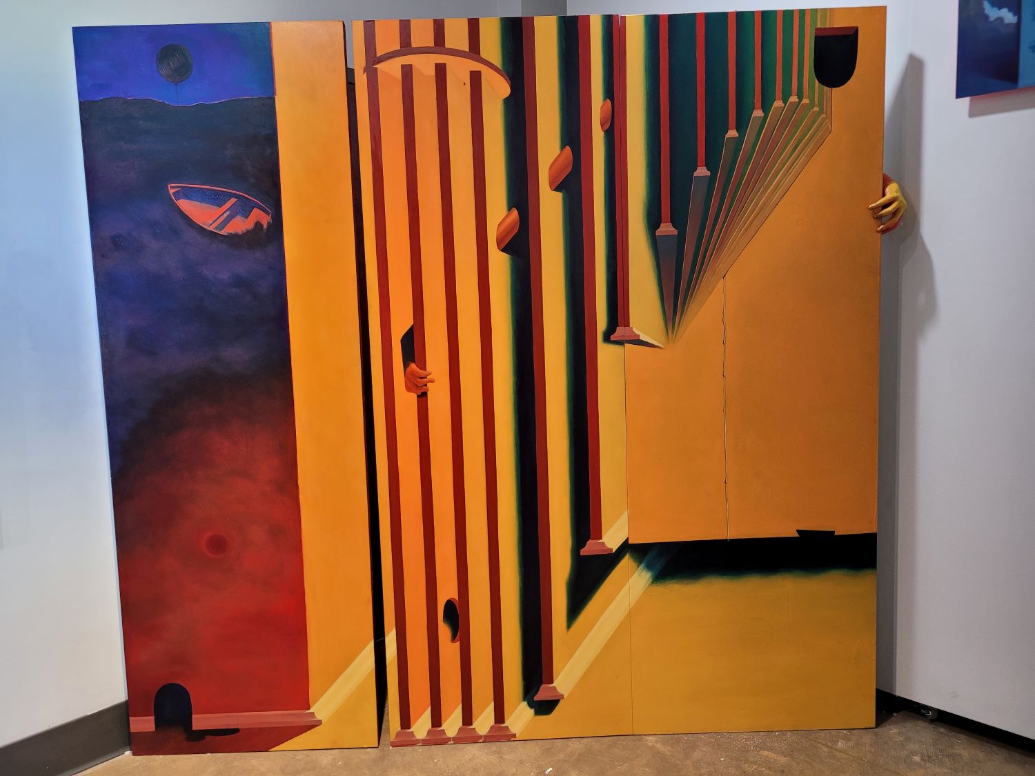 3 paintings on separate doors with surreal interior space, 3D hand on right side of doors