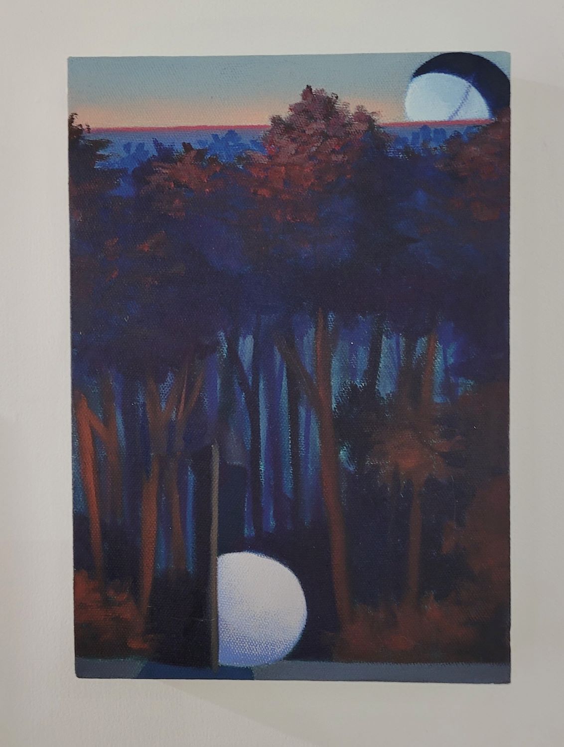 Small painting of a blue and red forest with two white spheres in it. 
