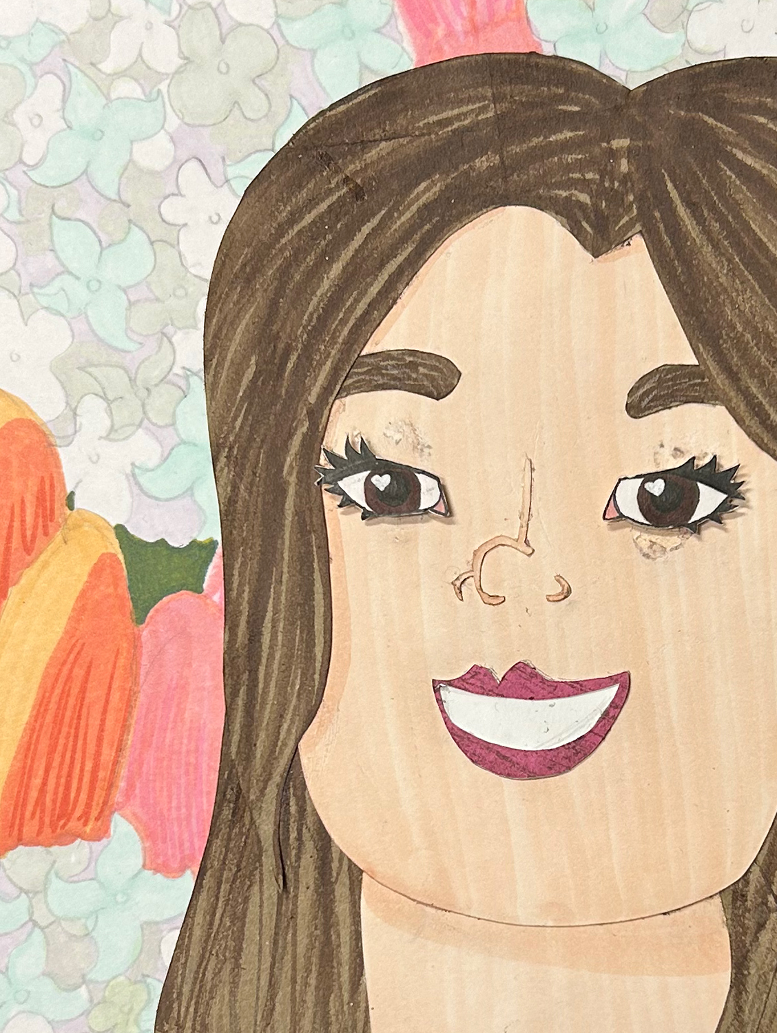 Close-up image of cut-paper portrait of a girl with dark and light brown hair and dark brown eyes. The image is closely cropped to her face. The background features drawn light blue hydrangeas and orange and pink tulips