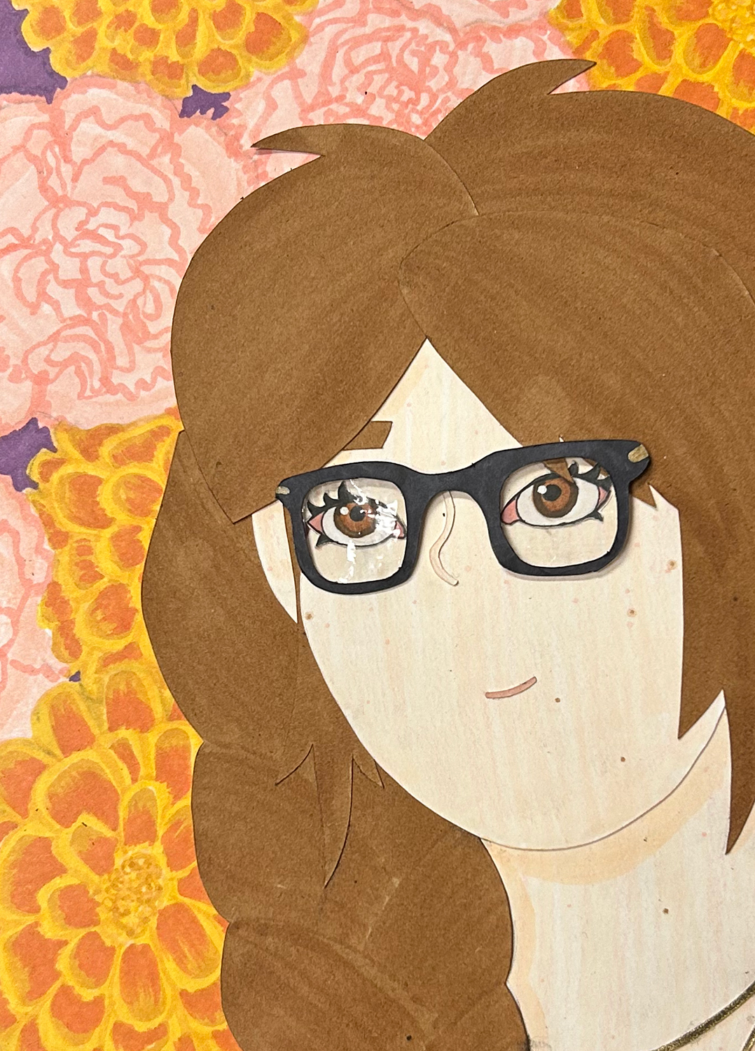 Close-up image of cut-paper portrait of a girl with brown hair in a braid, brown eyes, and freckles. She stares off towards the top left of the image through black glasses. The background is crowded with carnations and marigolds.
