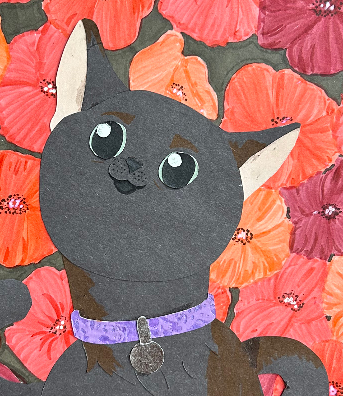 Close-up image of cut-paper portrait of a tortoiseshell cat with green eyes. A purple collar with a silver charm rests on the cat's neck. The background is filled with drawn poppies.