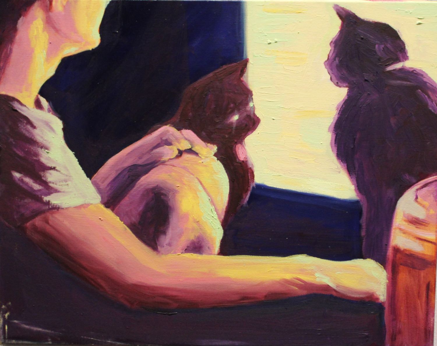 painting of two cats and a man facing the computer screen on the right